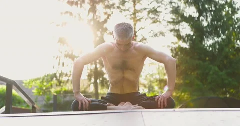 Shirtless man practicing breathing moving stomach muscles in circles.Athlete Stock Footage 158182114
