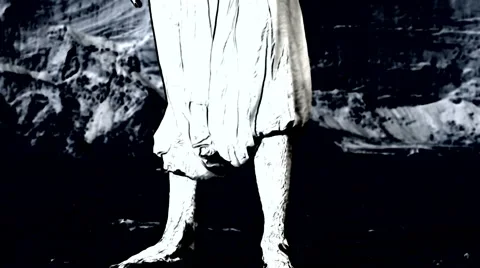 Shirtless man standing as a statue / Camera lifting up / Cartoon effect Stock Footage 51682293