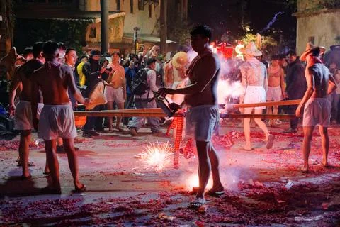 Shirtless Men Set Off Firecrackers as Crowds Watch Shezidao Lantern Festival Stock Photos