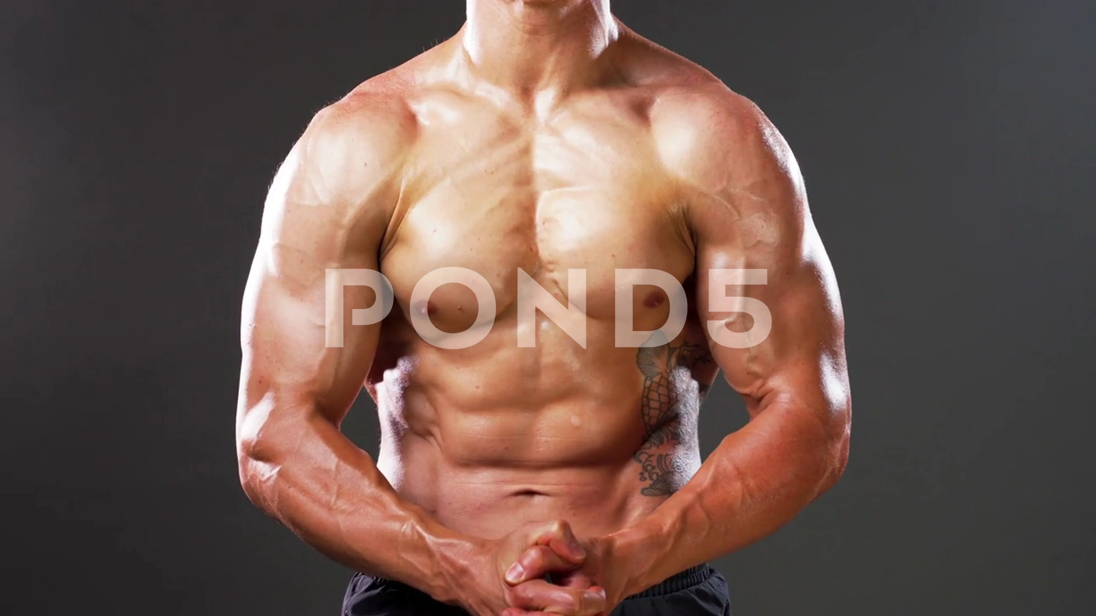 https://images.pond5.com/shirtless-muscular-man-flexing-his-footage-165420960_prevstill.jpeg