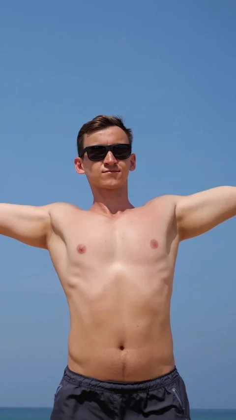 Shirtless White Man Posing Beach Travel With Sunglasses And Hands Behind Head 스톡 동영상 334615273
