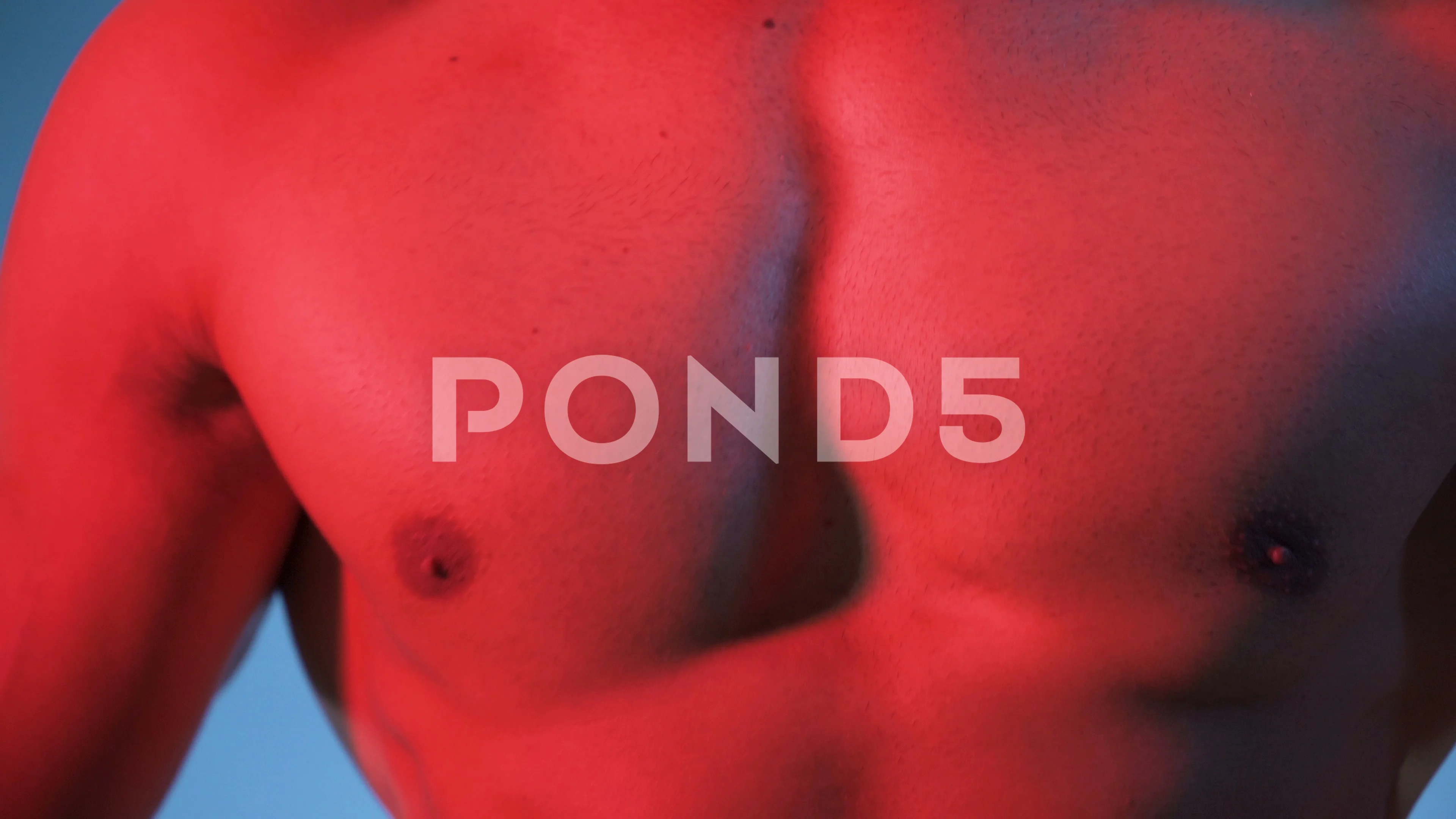 https://images.pond5.com/shirtless-young-man-flexing-chest-footage-118301525_prevstill.jpeg