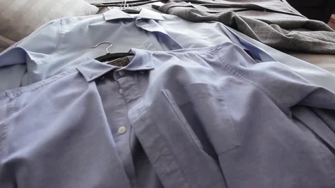 Shirts and coat in the bed Stock Footage 85072245