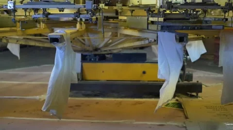 Shirts on screen printer Stock Footage 54678872