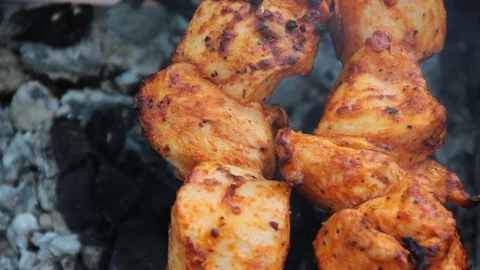 The shish kebab is fried on coals Stock Footage 87906678
