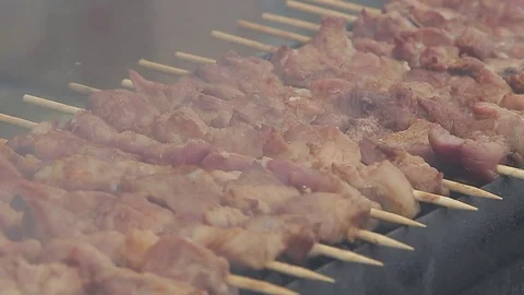 Shish kebab is fried on fire Stock Footage 72962268