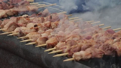 Shish kebab is fried on fire Video stock 72962377