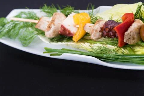 Shish kebab from an octopus Stock Photos