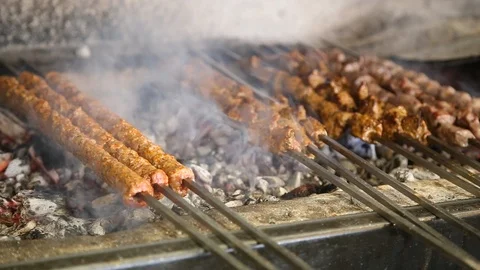 Shish kebab roasting on the barbecu. Stock Footage
