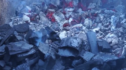 Shish kebabs are cooked on a big grill on a festive square. Stock Footage 100601093
