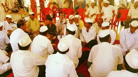 Shiv Mandir Ulwe Musicians Using Harmonium and Dholak Stock Footage 109407137