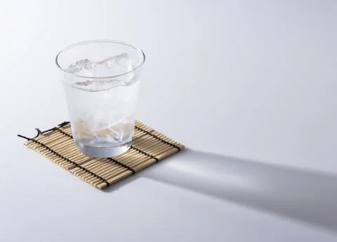 Shochu placed on a white background. Stock Photos