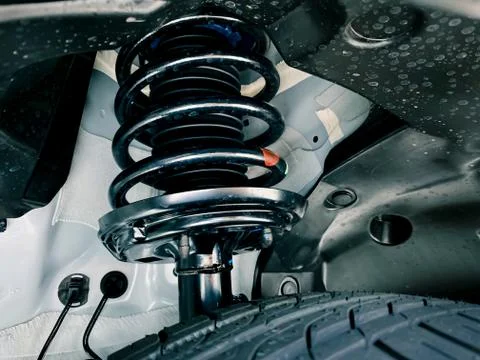 Shock absorber strut with coil spring, suspension system of modern car Stock Photos