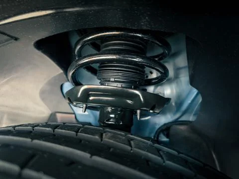 Shock absorber strut with coil spring Stock Photos
