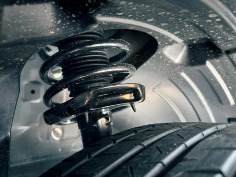 Shock absorber strut with coil spring Stock Photos