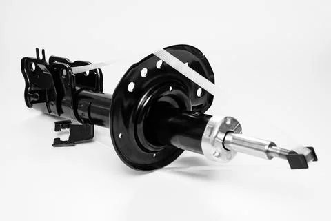 Shock absorber on a white background. Stock Photos