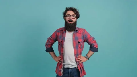 Shocked bearded man with joyful expression, achievement. Stock Footage 142573605