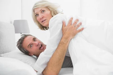 Shocked couple caught in the act Stock Photos
