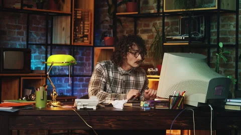 Shocked male programmer in 80s having problems with computer virus, retro office Stock Footage 315455920