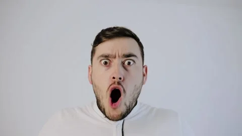 Shocked man put hands on head and very surprised Stock Footage 132780416