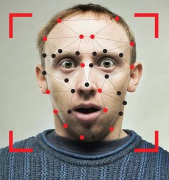 Shocked man with technology biometric security system. Facial recognition c.. Stock Photos