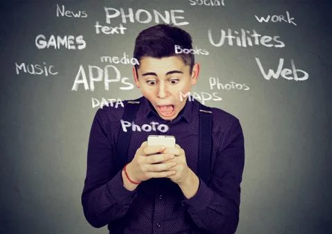 Shocked man using smart phone Stock Photos