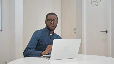 Shocked Young African Man while Looking at Camera Stock Footage 309508183