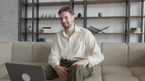Shocked Young Office Worker Reading Bad News Looking at Laptop Computer Stock Footage 294330599