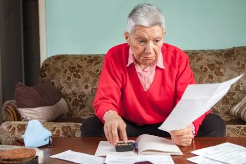 Shocking amount of bills an old lady has to pay for Stock Photos