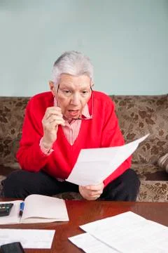 Shocking amount of bills an old lady has to pay for Stock Photos