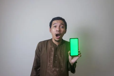 Shocking while using smartphone Stock Photos