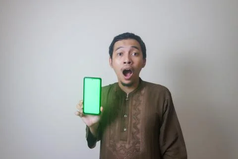 Shocking while using smartphone Stock Photos