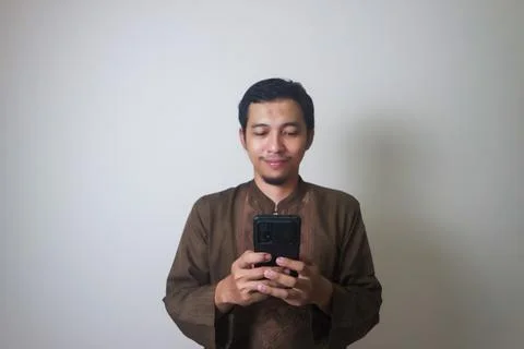 Shocking while using smartphone Stock Photos