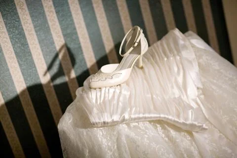 Shoe of the bride Stock Photos