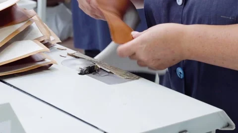 Shoe Factory - Shoes making process with worker Stock Footage 136729696