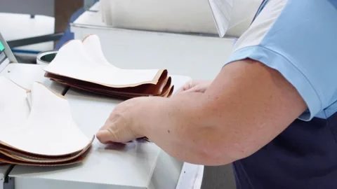 Shoe Factory - Shoes making process with worker Stock Footage 136729702