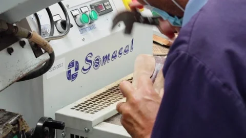 Shoe Factory - Shoes making process with worker Stock Footage 136729708