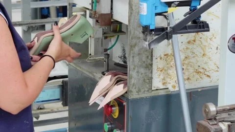 Shoe Factory - Shoes making process with worker Stock Footage 136729736