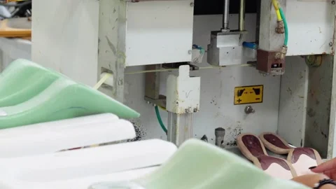Shoe Factory - Shoes making process with worker Stock Footage 136729746