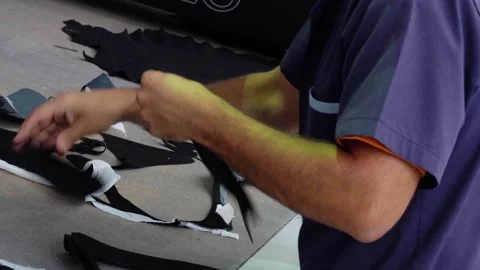 Shoe Factory - Shoes making process with worker Stock Footage 136729763