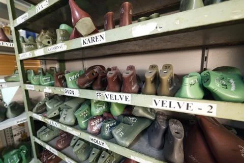 Shoe lasts on a shelf Stock Photos