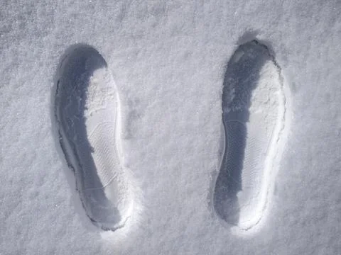 Shoe prints in the snow Stock Photos