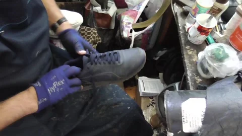 Shoe repair Stock Footage 244900405