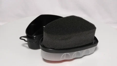 A shoe shiner on white surface and moving Stock Footage 111887909