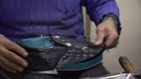 Shoemaker is Making Shoes 4K UHD Clip Stock Footage 71748008
