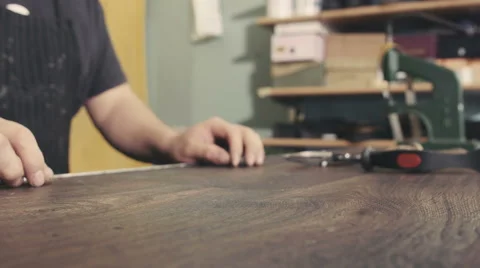 Shoemaker with pair of boots Vidéo 61774107