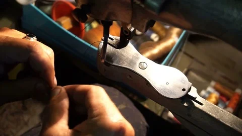 Shoemaker repairing shoes. Workshop Stock Footage 77879799