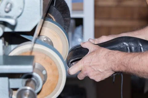 The shoemaker repairs a shoe Stock Photos
