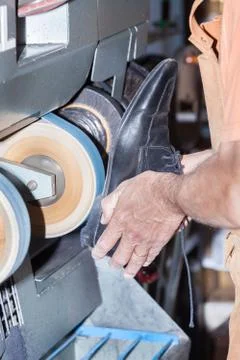 The shoemaker repairs a shoe Stock Photos