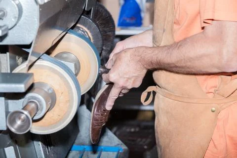 The shoemaker repairs a shoe Stock Photos